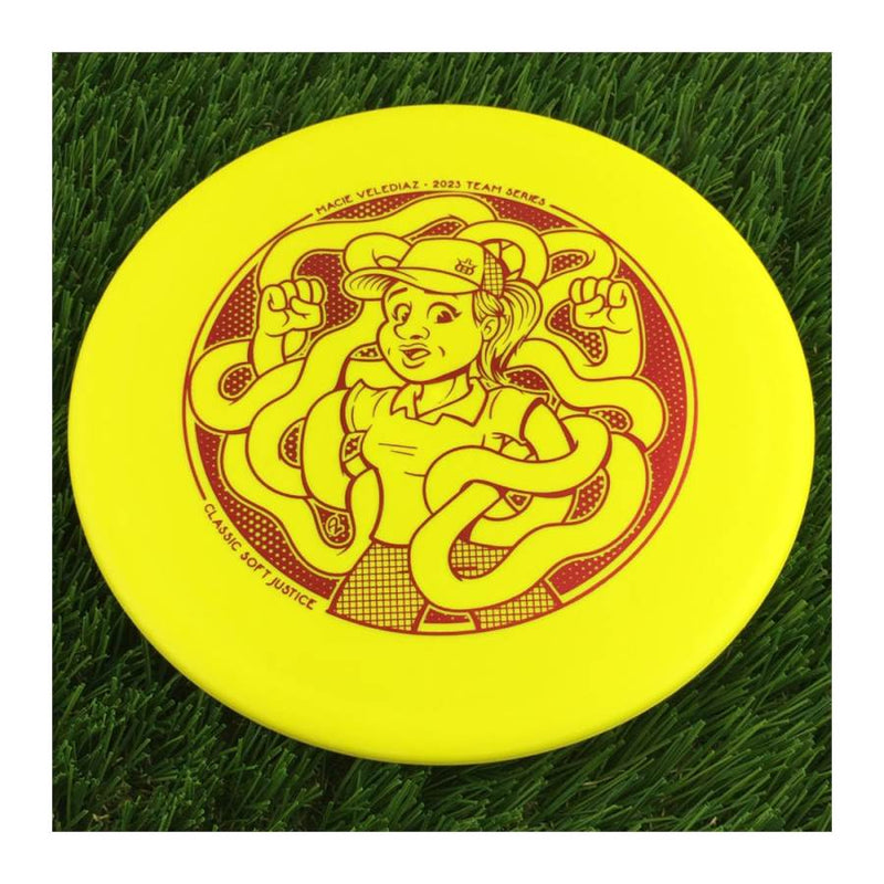 Dynamic Discs Classic Soft Justice with Macie Velediaz 2023 Team Series Stamp - 174g - Solid Yellow