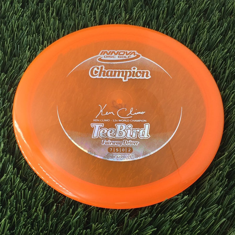 Innova Champion Teebird with Ken Climo 12 Time World Champion Signature Stamp - 162g - Translucent Orange