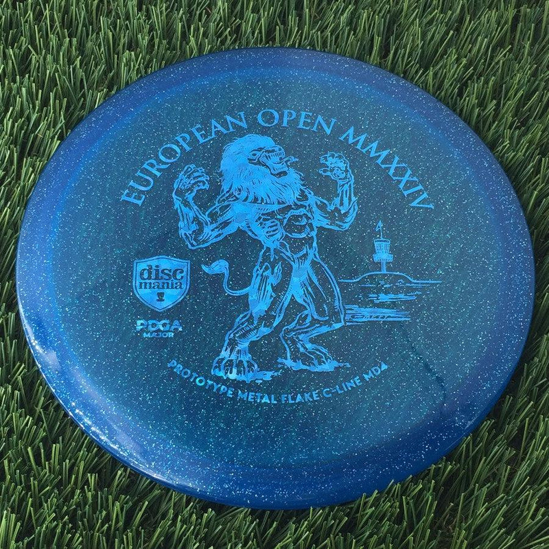 Discmania Italian C-Line Metal Flake MD4 with European Open MMXXIV | PDGA Major | EO2024 Fundraiser Prototype Stamp - 178g - Translucent Blue