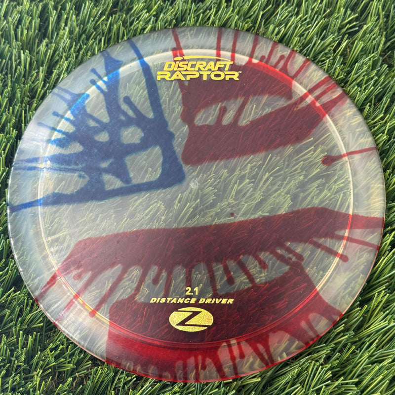 Discraft Elite Z Fly-Dyed Raptor with 2023 New Font Stamp - 172g - Translucent Flag