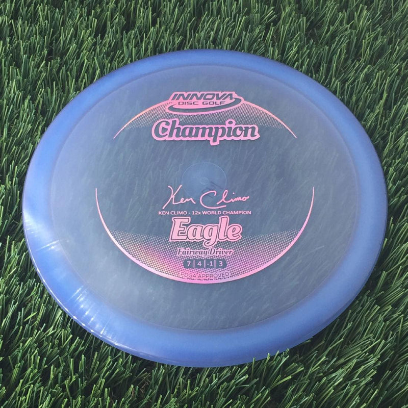 Innova Champion Eagle with Ken Climo - 12x World Champion New Stamp Stamp - 147g - Translucent Blue