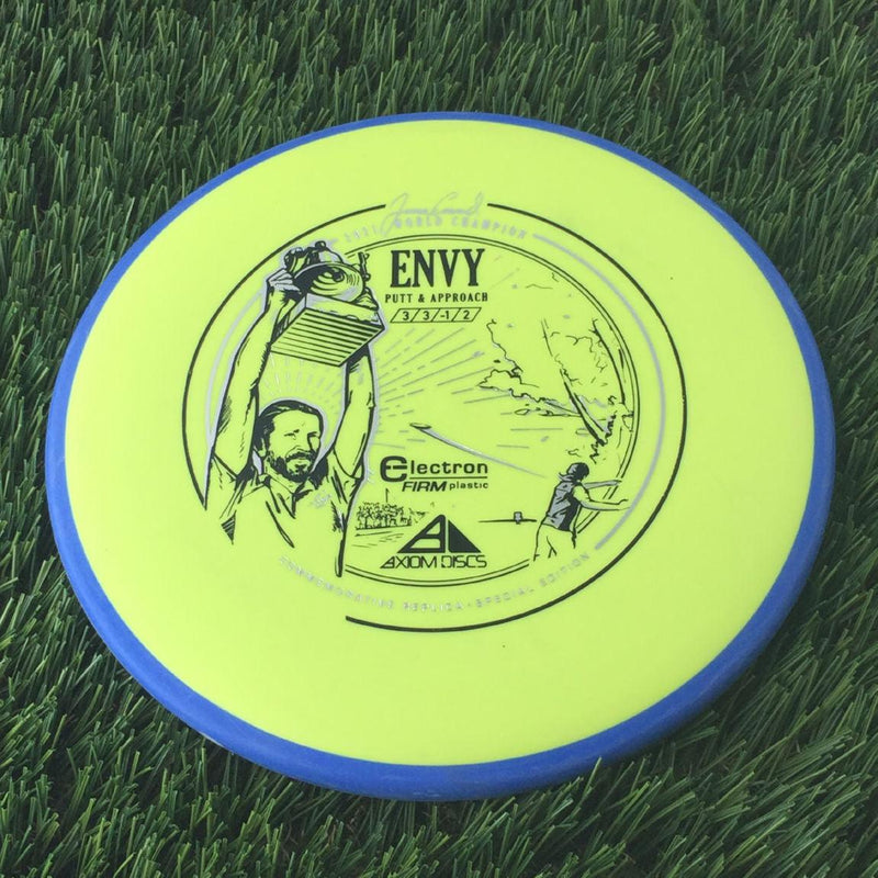 Axiom Electron Firm Envy with James Conrad 2021 World Champion Commemorative Replica Special Edition - Art by Mike Inscho Stamp - 172g Yellow