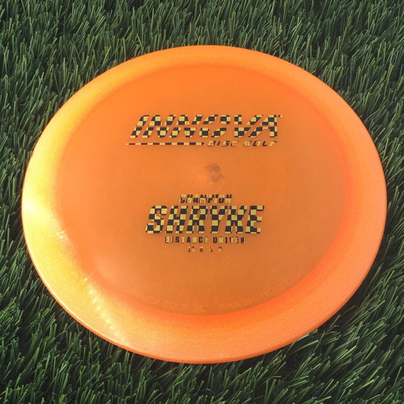 Innova Champion Champion Shryke with Burst Logo Stock Stamp - 162g - Translucent Orange