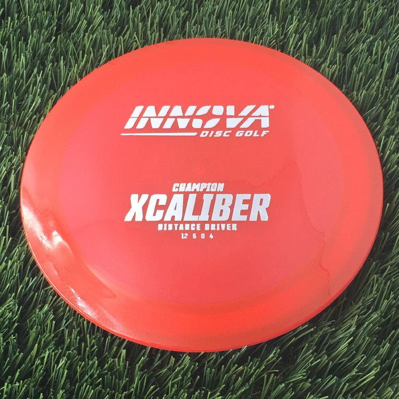 Innova Champion Xcaliber with Burst Logo Stock Stamp - 172g - Translucent Red