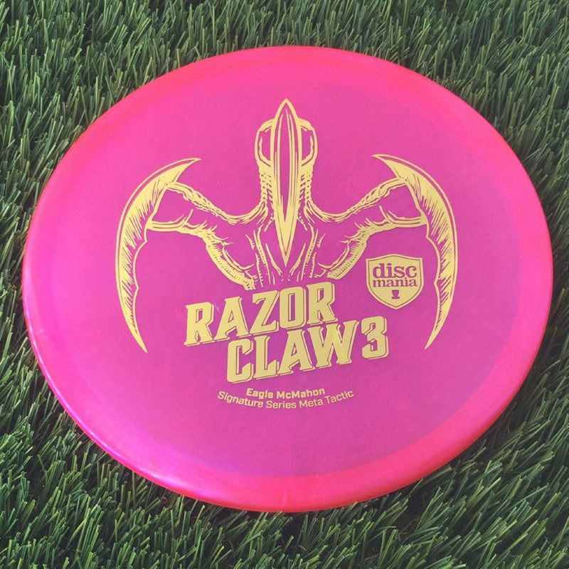 Discmania Evolution Meta Tactic with Razor Claw 3 - Eagle McMahon Signature Series Stamp - 176g - Translucent Pink