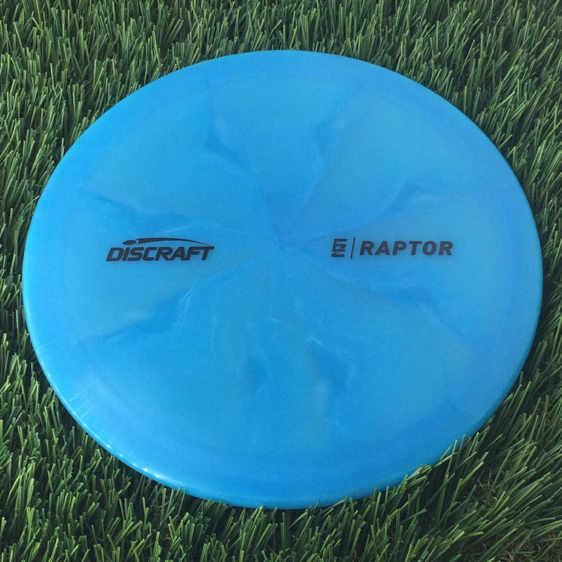 Discraft Elite Z Swirl Raptor with Ezra Aderhold - EZ Small Logo Stamp - 174g - Translucent Blue