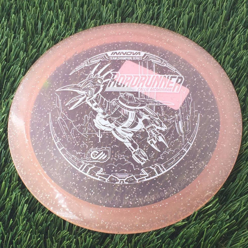 Innova Champion Metal Flake Roadrunner with Callie McMorran Team Champion Tour Series 2022 Stamp - 175g - Translucent Pink