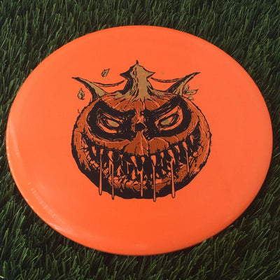 Dynamic Discs BioFuzion EMAC Truth with Scary Pumpkin with DD Crown - Triple Foil 2024 Stamp - 177g Orange