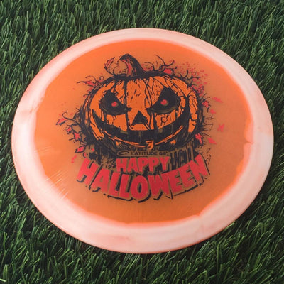 Latitude 64 Opto Ice Orbit Saint Pro with Happy Halloween Spooky Pumpkin - Triple Foil 2024 Stamp - 175g - Translucent Orange