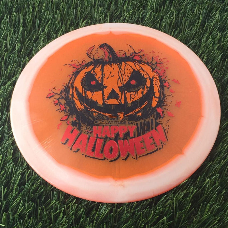 Latitude 64 Opto Ice Orbit Saint Pro with Happy Halloween Spooky Pumpkin - Triple Foil 2024 Stamp - 176g - Translucent Orange