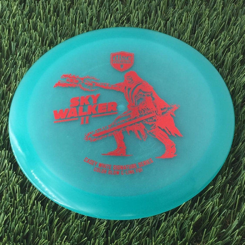 Discmania C-Line Color Glow Reinvented FD1 with Casey White Signature Series 2024 - Sky Walker II Stamp - 176g - Translucent Blue