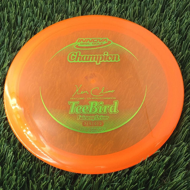 Innova Champion Teebird with Ken Climo - 12x World Champion New Stamp Stamp - 167g - Translucent Orange