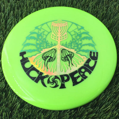 Discmania Soft Neo Spore with Huck Peace - Small TriFly in the Forest - Triple Foil Stamp - 159g - Translucent Muted Green