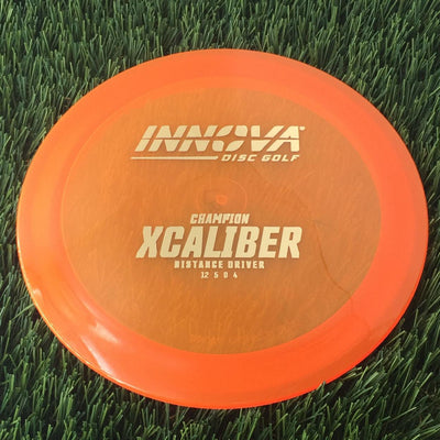 Innova Champion Xcaliber with Burst Logo Stock Stamp - 175g - Translucent Orange