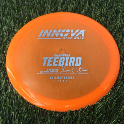 Innova Champion Teebird with Ken Climo 12x World Champion Burst Logo Stamp - 169g - Translucent Orange