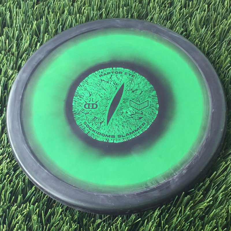 Dynamic Discs Classic Supreme SockiBomb Slammer with Raptor Eye Sockibomb Stamp - 175g Green