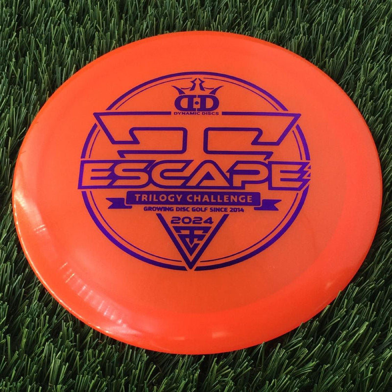 Dynamic Discs Lucid Ice Glimmer Escape with 2024 Trilogy Challenge Stamp - 172g - Translucent Orange