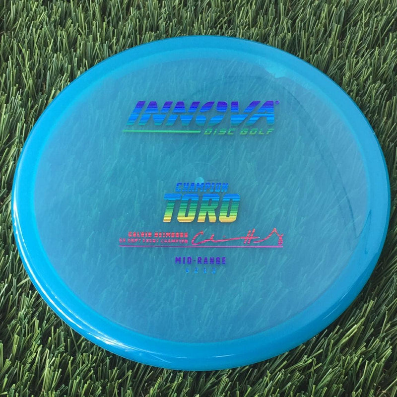 Innova Champion Toro with Calvin Heimburg 5X DGPT Event Champion Stamp - 171g - Translucent Blue