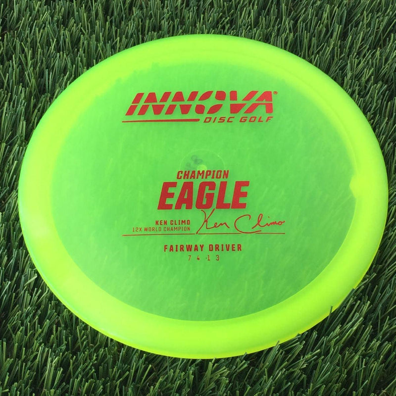 Innova Champion Eagle with Ken Climo 12X World Champion Signature Burst Logo Stock Stamp - 168g - Translucent Yellow