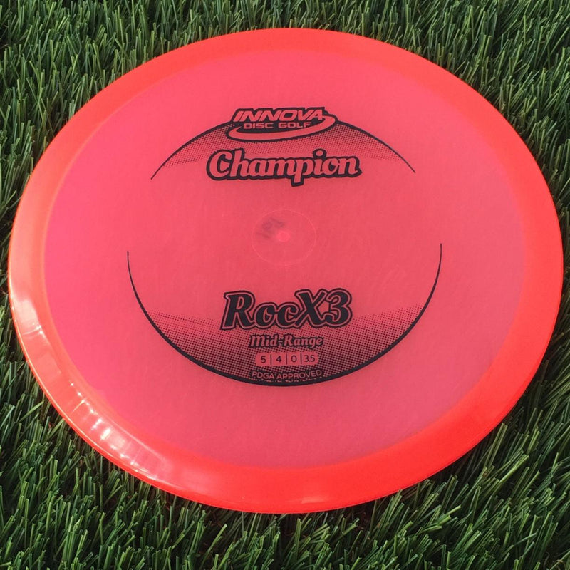 Innova Champion RocX3 with Circle Fade Stock Stamp - 169g - Translucent Bright Pink