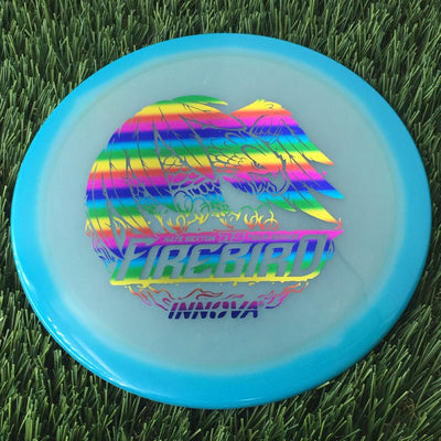 Innova Proto Glow Halo Champion Firebird with Nate Sexton 2024 Tour Series Stamp - 175g - Translucent Turquoise Blue