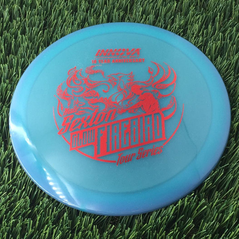 Innova Proto Color Glow Champion Firebird with Nate Sexton "Sexybird" 10 Year Anniversary Tour Series Stamp - 175g - Translucent Blue