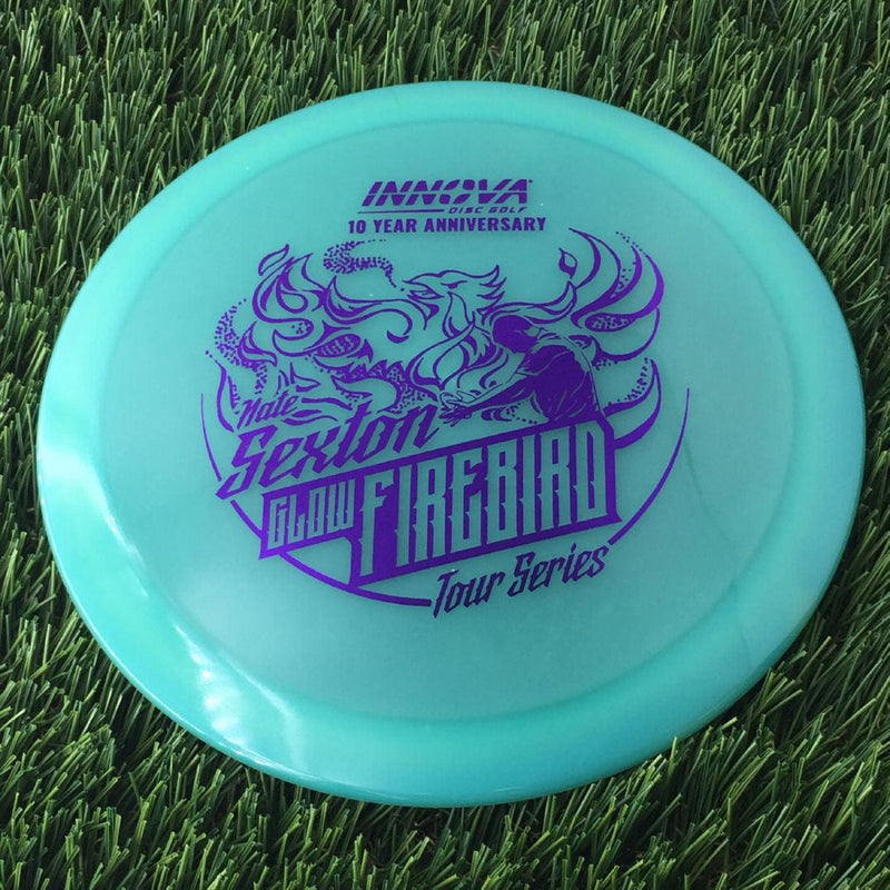 Innova Proto Color Glow Champion Firebird with Nate Sexton "Sexybird" 10 Year Anniversary Tour Series Stamp - 175g - Translucent Teal Green