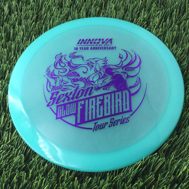 Innova Proto Color Glow Champion Firebird with Nate Sexton "Sexybird" 10 Year Anniversary Tour Series Stamp - 175g - Translucent Teal Green