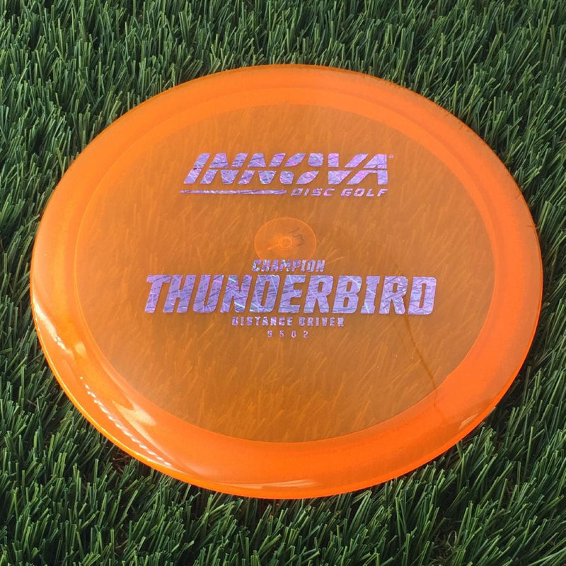 Innova Champion Thunderbird with Burst Logo Stock Stamp - 171g - Translucent Orange