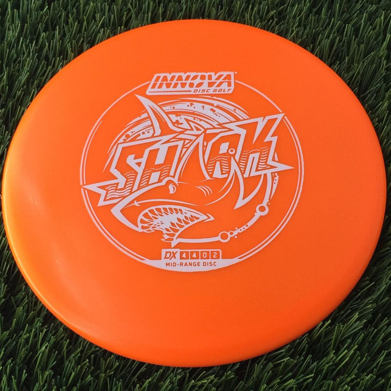 Innova DX Shark with Burst Logo Stock Stamp - 153g Orange