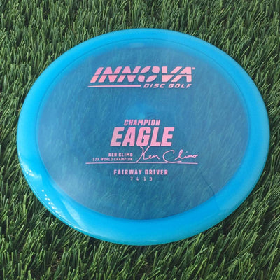 Innova Champion Eagle with Ken Climo 12X World Champion Signature Burst Logo Stock Stamp - 167g - Translucent Blue