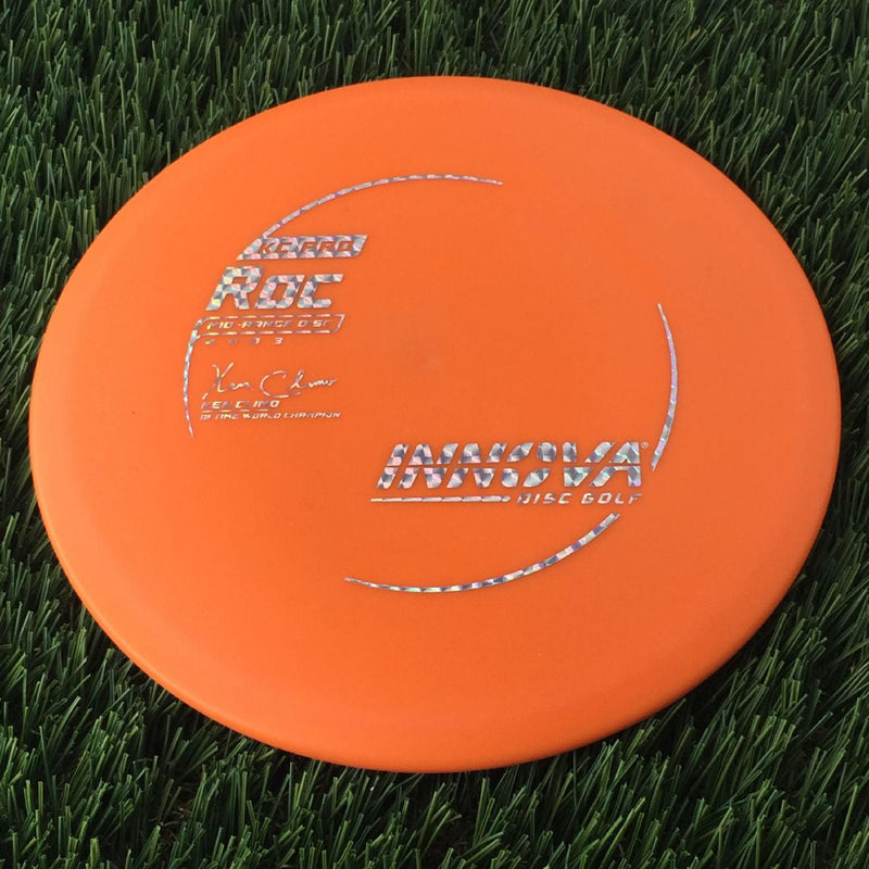 Innova Pro KC Roc with Ken Climo 12 Time World Champion Burst Logo Stamp - 157g Orange