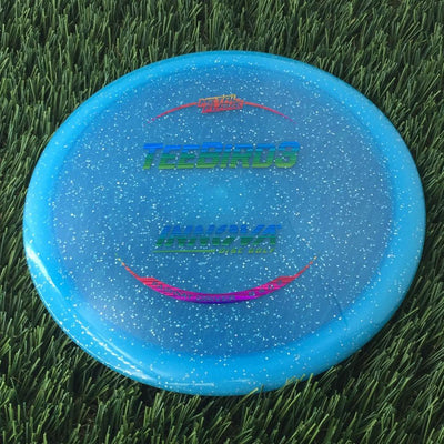 Innova Champion Metal Flake Teebird3 with Burst Logo Stock Stamp - 175g - Translucent Blue