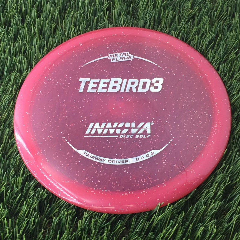 Innova Champion Metal Flake Teebird3 with Burst Logo Stock Stamp - 171g - Translucent Dark Pink