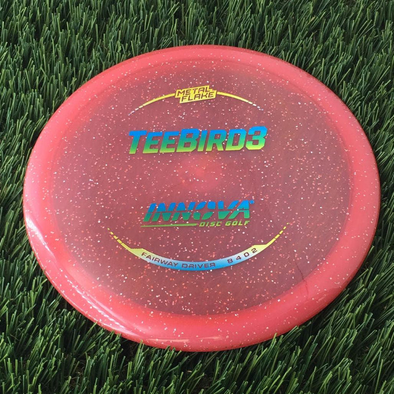 Innova Champion Metal Flake Teebird3 with Burst Logo Stock Stamp - 171g - Translucent Dark Pink