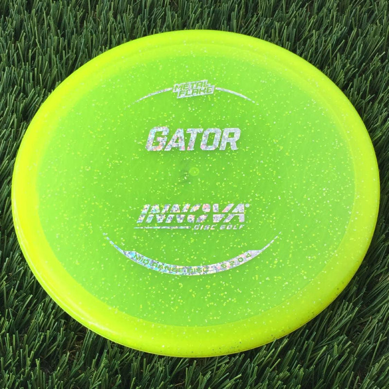 Innova Champion Metal Flake Gator with Burst Logo Stock Stamp - 175g - Translucent Yellow