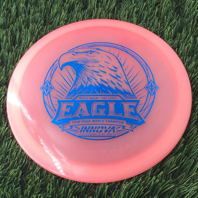 Innova Proto Glow Champion Eagle with Gregg Barsby Star Team Tour Series 2025 Stamp- 175 Pink
