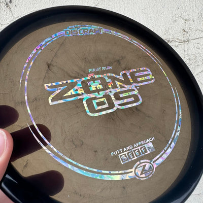 Enchères! Jan '24 - Système d'exploitation Discraft Elite Z Zone avec tampon First Run - 175 g - Noir translucide - Petite éraflure sur la jante